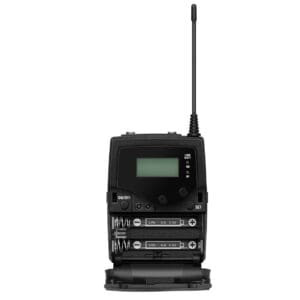 Wireless microphone transmitter with open battery compartment.