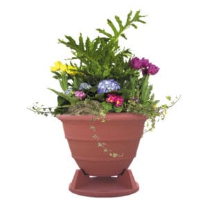 Potted flowers in a brown planter.