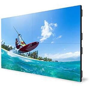 Windsurfer jumping on ocean wave display.