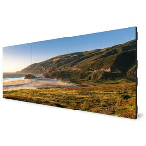 Video wall displaying scenic coastal landscape.