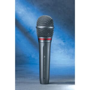 Black and silver microphone on blue background.
