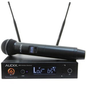 Wireless microphone and receiver set on display.