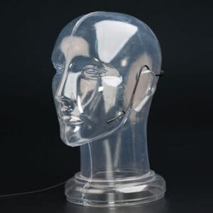Clear mannequin head with attached wire.