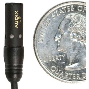 Microphone beside a U.S. quarter coin.