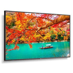 Boat on turquoise lake, autumn foliage background.