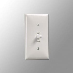 White light switch on gray wall.