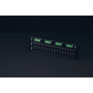 Black audio equipment with green digital displays.