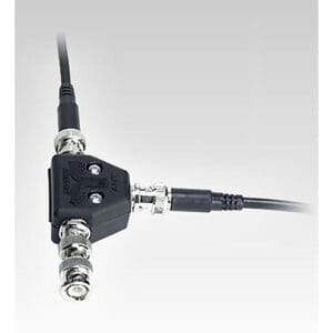 Coaxial cable splitter with connected cables.