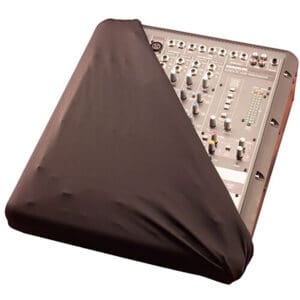 Audio mixer partially covered with cloth.
