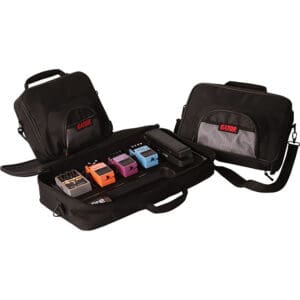 Guitar effects pedals in black carrying cases.
