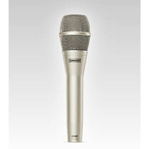 Silver handheld microphone with mesh grille.