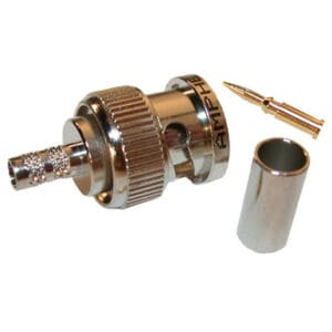 Metal coaxial cable connector with components.