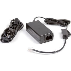 Black power adapter with cables and connectors.