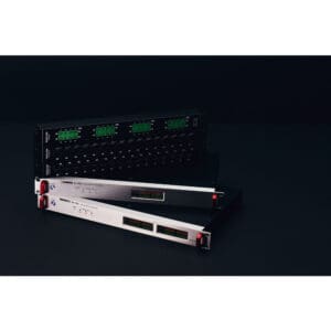 Audio equipment in a dark studio setting.