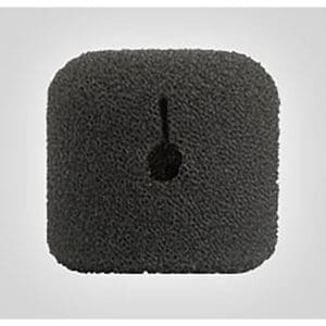 Black foam microphone windscreen on gray background.