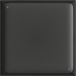 Black square speaker with textured front panel.
