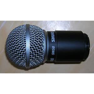 Shure SM58 microphone on a table.