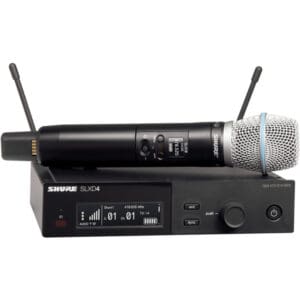 Shure wireless microphone and receiver set.