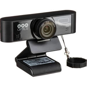 Black external webcam with lens cover attached.