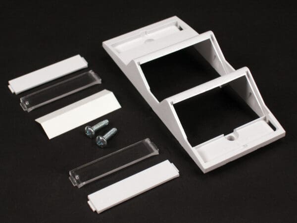 Triple wall plate kit with screws.