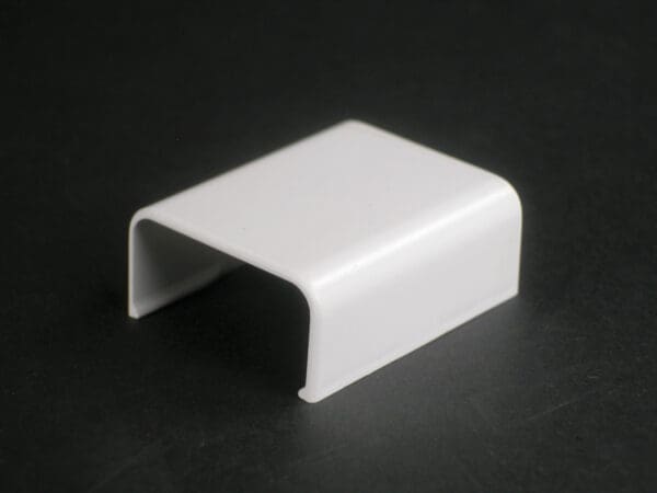 2906 Uniduct® Cover Clip Fitting in Ivory