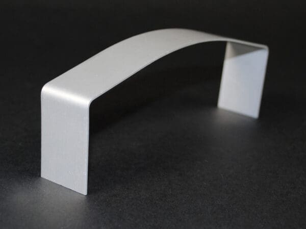 Silver metal arched display stand.