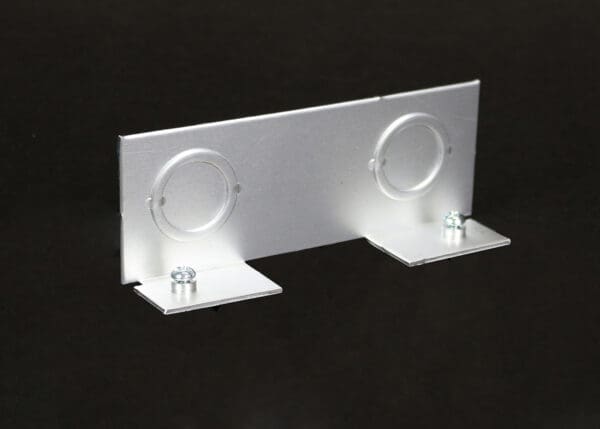 Aluminum plate with two cable openings.