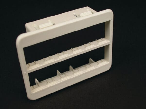 White plastic two-tier rack mount.