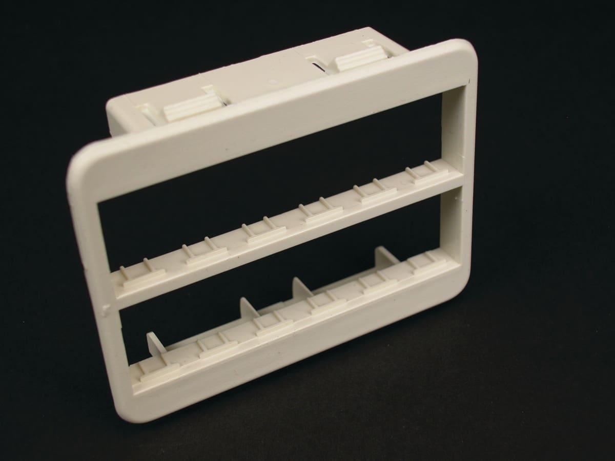 White plastic two-tier rack mount.