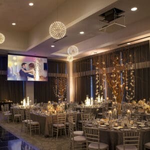 Elegant wedding reception with projector.