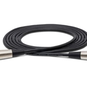 XLR microphone cable coiled on white background.