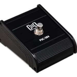 Black guitar footswitch with silver button.