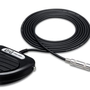 Black guitar pedal with attached cable.