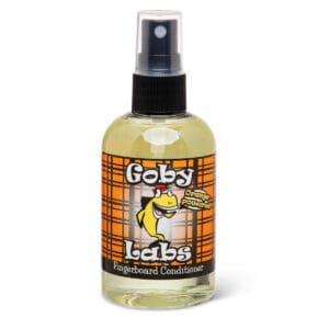 Fingerboard conditioner spray bottle with label.