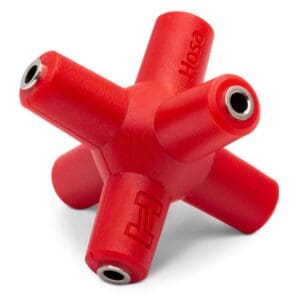 Red multi-port audio splitter on white background.