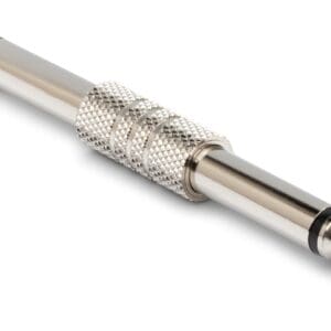 Metal guitar pedal connector on white background.