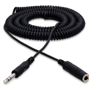 Coiled black audio extension cable on white.