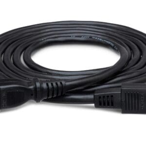 Black electrical power cable coiled on surface.