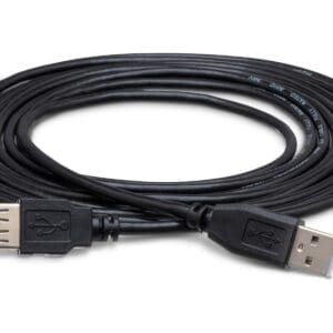 Black USB extension cable coiled on surface.